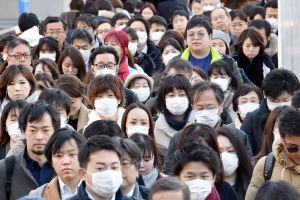 Alasan di balik kegemaran warga Jepang memakai masker