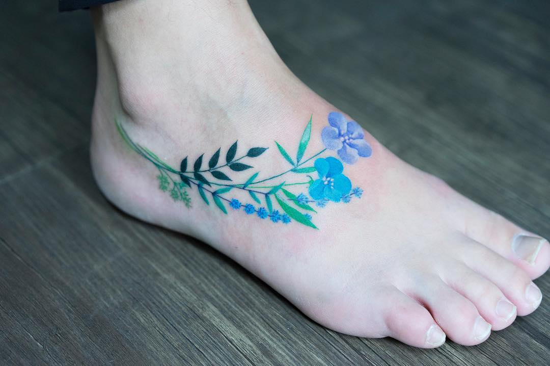 Seniman ini ciptakan desain tato warna-warni terinspirasi dari alam