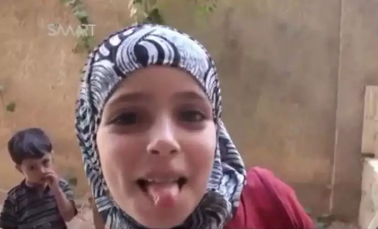 Anak-anak Suriah ini tersenyum saat membahas tentang kematian