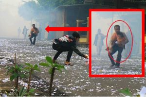 Duh...pria ini ledakkan petasan sambil gendong anak bayi