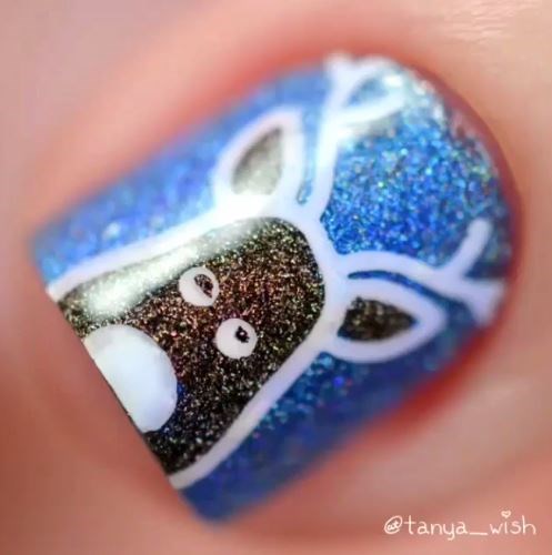 25 Nail art yang bikin kamu buru-buru ngecat kuku merayakan Natal