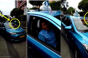Wah! Pengemudi Gojek ini naik taksi Blue Bird pakai atribut lengkap
