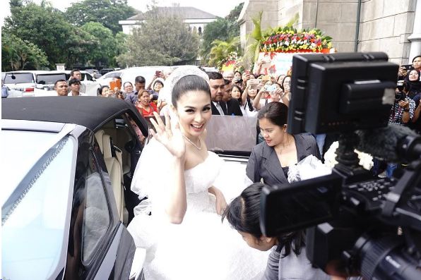 9 Foto romantis pernikahan Sandra Dewi - Harvey Moeis
