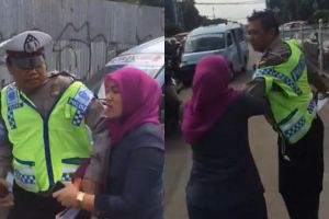 Tak terima ditilang, emak-emak ini malah ngamuk dan mencakar polisi
