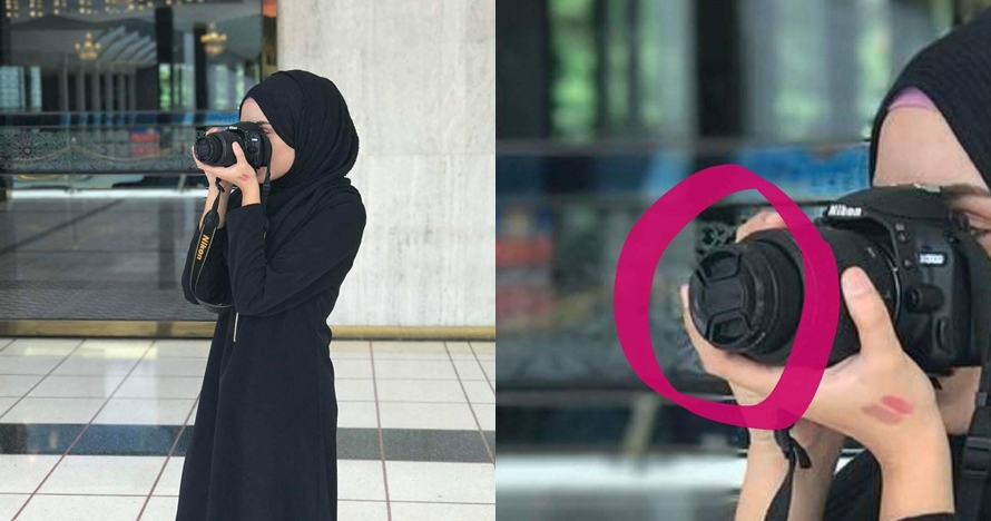 Ada yang janggal di foto wanita berpose pakai kamera DSLR ini, apa ya?