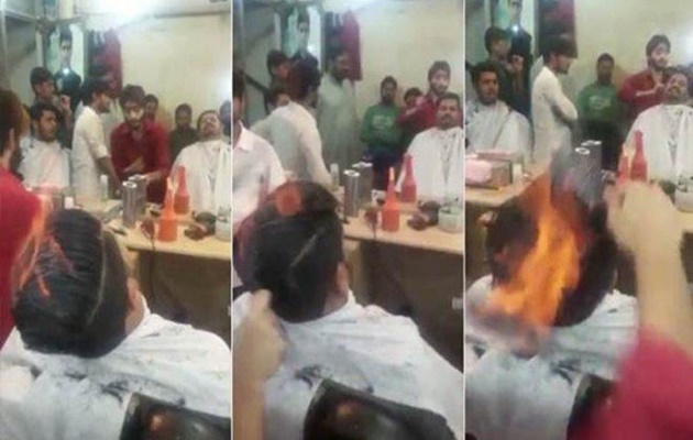 Tukang cukur ini potong rambut pakai api, kamu berani coba?