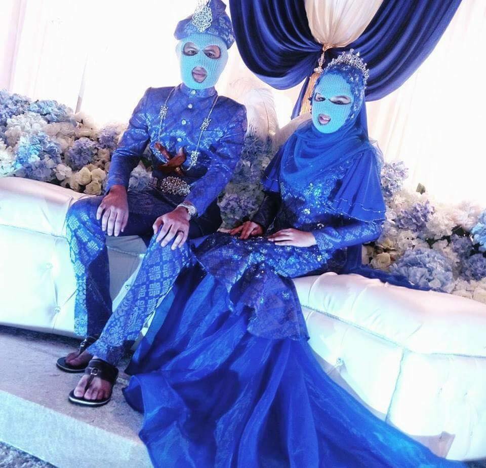 Pasangan pengantin gunakan topeng saat resepsi, ini penjelasannya