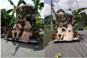 Pasangan ini nikah dengan dekorasi pohon pisang, diarak keliling desa