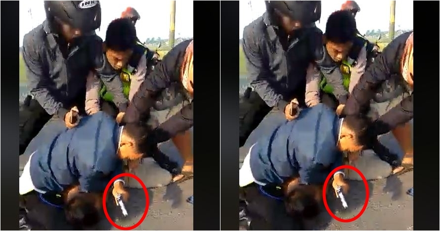 Detik-detik menegangkan polisi meringkus pria bersenjata di jalan
