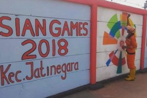 Baru selesai dibuat, mural Asian Games ini sudah dicoret-coret