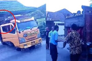 Tersangkut di gapura, cara keluarkan truk ini simpel tapi smart banget