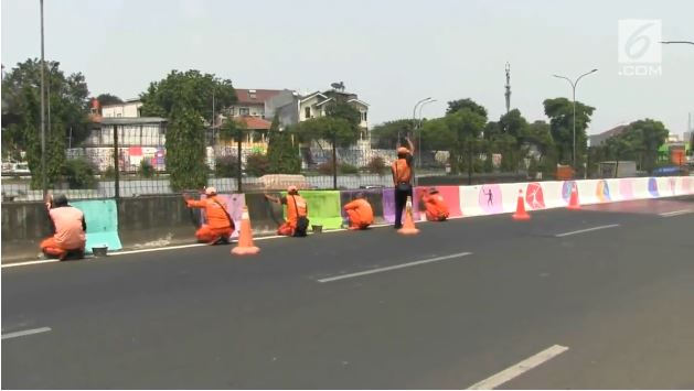 Kembali dicat hitam-putih, ini 11 potret perubahan separator Jakarta