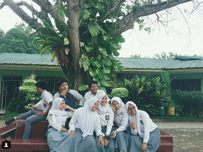 10 Foto perjuangan Nina Gusmita, atlet voli cantik di Asian Para Games