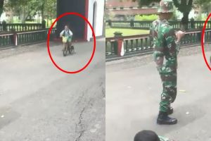 Viral bocah bersepeda di markas TNI & tabrak senapan, bikin ketawa