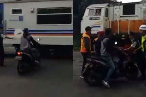 Paksa terobos palang kereta, kelakuan pria ini bikin geram