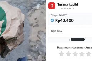 Order minuman tumpah, driver ojek online ini ganti uang ke pelanggan