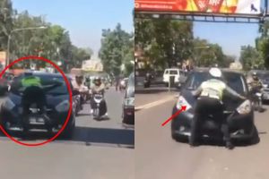 Aksi heroik polisi berhentikan pengemudi sampai naik ke kap mobil