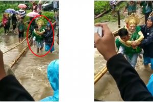 Detik-detik haru mempelai pria gendong istri seberangi sungai