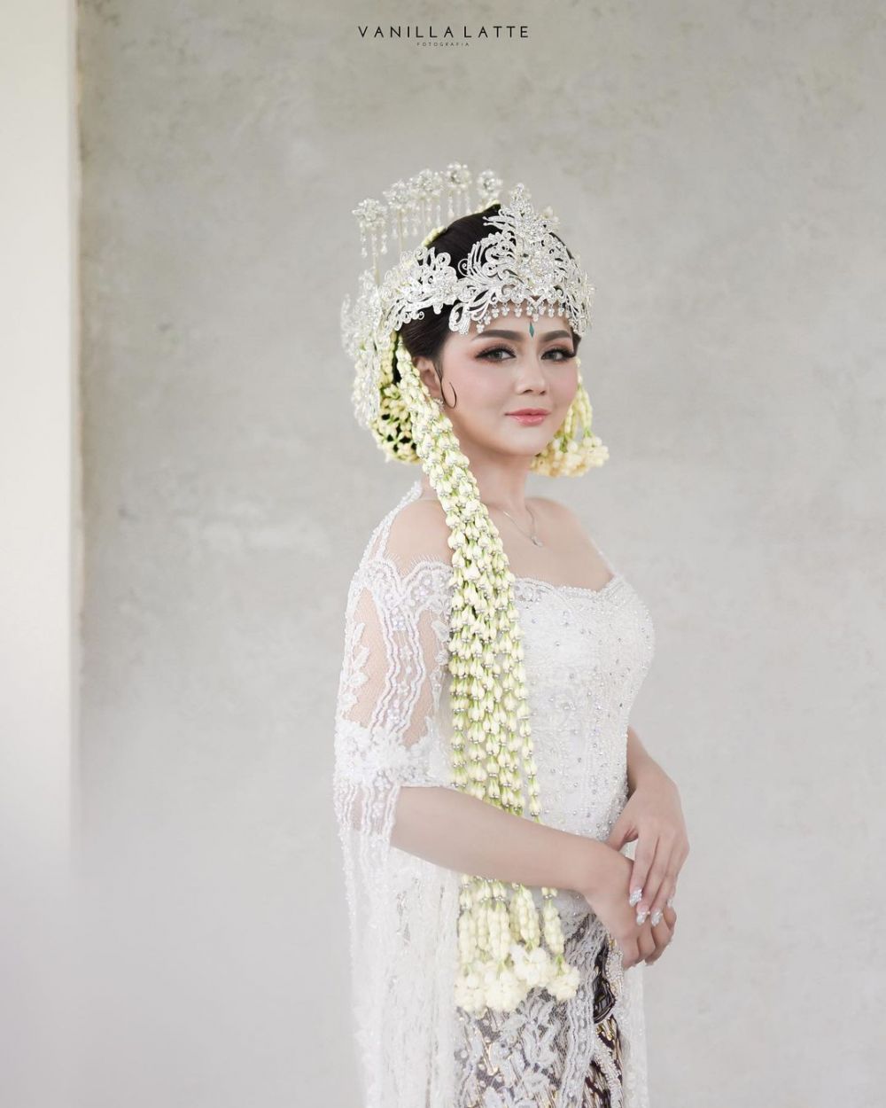 9 Momen pernikahan Jenita Janet, penuh khidmat