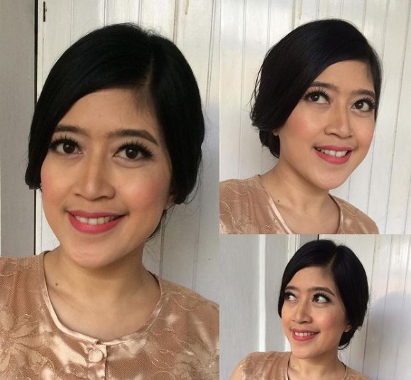 Beda gaya kondangan 6 vokalis band wanita, Tantri Kotak tampil anggun