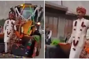 Bukan mobil mewah, pengantin ini naik buldozer yang didesain unik
