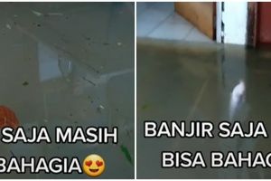 Rumah kebanjiran, pria ini justru asyik mancing di depan pintu