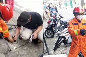 Petugas damkar gerak cepat evakuasi uang Rp 100 ribu di gorong-gorong