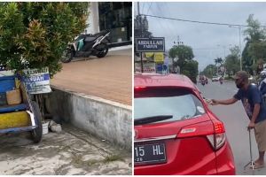 Jadi tukang parkir meski sedang stroke, kisah kakek ini bikin haru