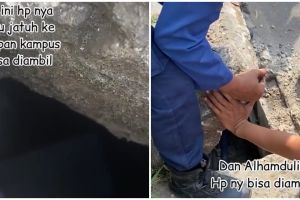 HP wanita ini jatuh di selokan, reaksi tim damkar tuai pujian