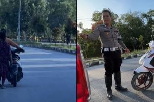 Aksi polisi cegat pasangan kakek nenek yang motornya mogok ini tuai apresiasi