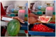 Tanpa butuh talenan, ini trik memotong semangka bentuk dadu untuk es buah