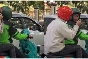 Aksi kocak pria makan di motor saat diantar ojek online ini bikin ngakak, bawaannya rantang