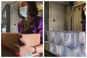 Cara pramugari cantik keluarkan aqua gelas dari kardus ini bikin kagum