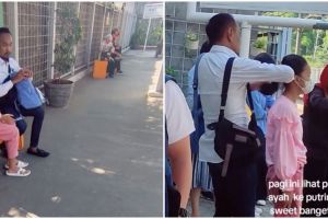 Momen haru seorang ayah kuncir rambut anaknya di peron stasiun, sikapnya bikin hati meleleh