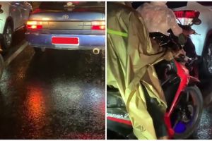 Momen cewek ketemu pengendara motor di lampu merah ini bikin nyengir, bentuk mantelnya antimainstream