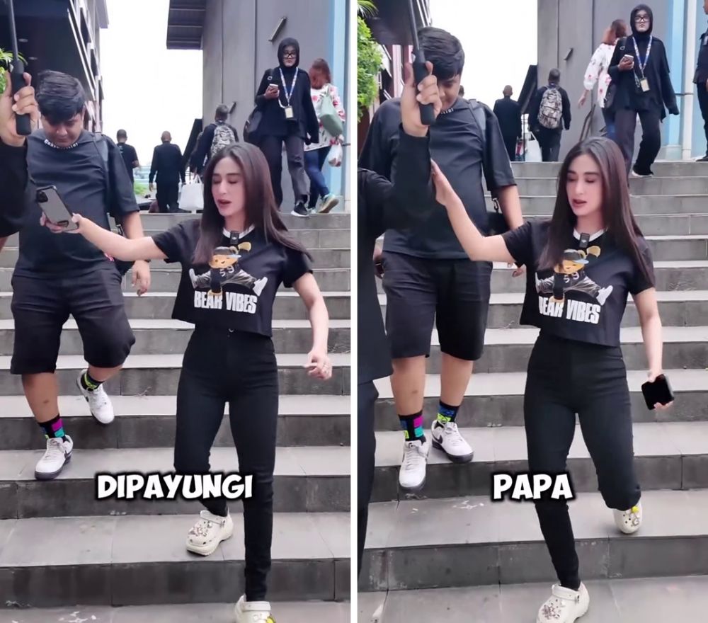 Dewi Perssik menolak dipayungi oleh petugas keamanan, sikapnya saat keberatan dilayani banjir pujian