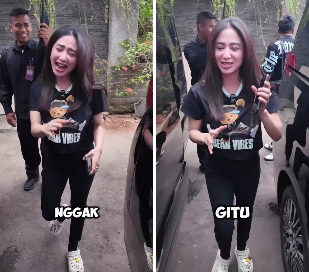 Dewi Perssik menolak dipayungi oleh petugas keamanan, sikapnya saat keberatan dilayani banjir pujian