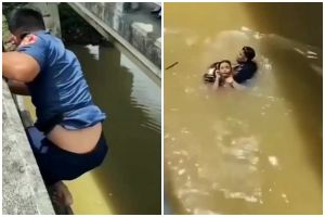 Viral petugas damkar lompat dari jembatan demi selamatkan wanita, aksi heroiknya diacungi jempol