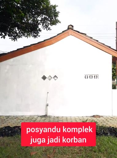 Awalnya kumuh dan penuh coretan, tembok bangunan posyandu ini jadi estetik usai dilukis wanita ini