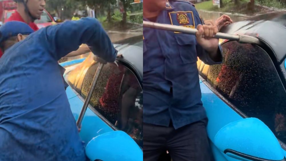 Kunci ketinggalan di dalam Porsche 5 jam, pria ini terpaksa panggil petugas Damkar pecahkan kaca