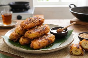 Resep pisang goreng madu renyah dan legit, lapisan manisnya bikin nagih