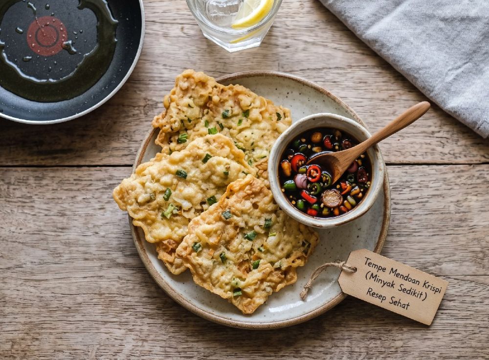 Resep tempe goreng mendoan tetap krispi walaupun dimasak pakai minyak sedikit, ini triknya