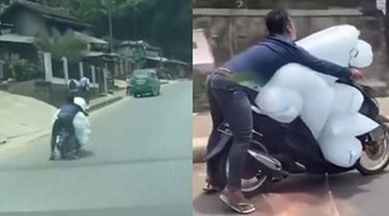 pengendara motor bawa es batu © berbagai sumber pengendara motor bawa es batu © berbagai sumber