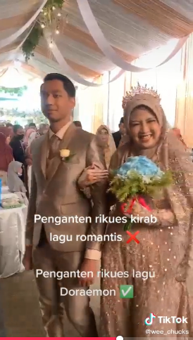 Pernikahan diiringi lagu doraemon Tiktok Pernikahan diiringi lagu doraemon Tiktok