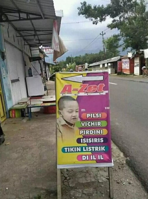 spanduk jualan huruf vokalnya diganti I semua © berbagai sumber