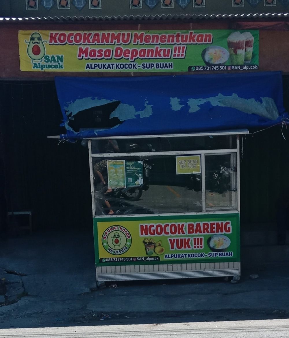 spanduk jualan pedagang es ini kreatif © berbagai sumber