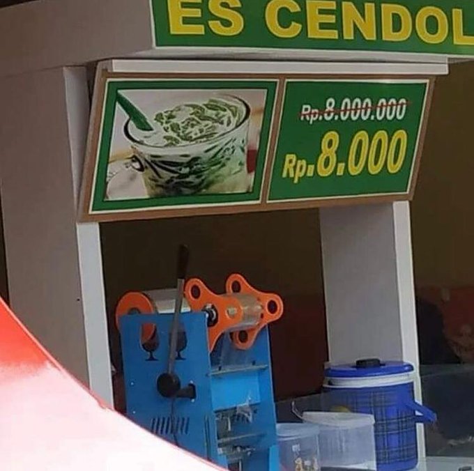 potret spanduk jualan terlihat murah © berbagai sumber