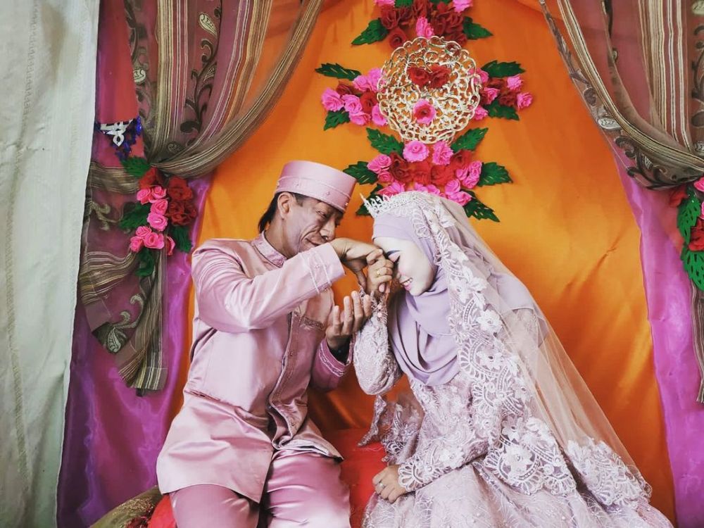 Momen Surya Manurung dan istri © 2022 Instagram Momen Surya Manurung dan istri © 2022 Instagram