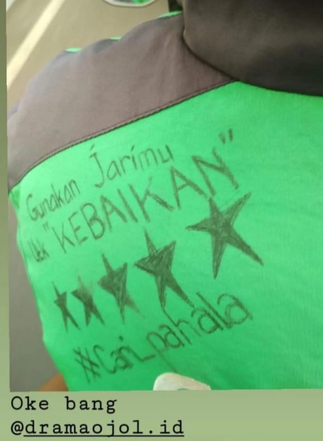 Potret tulisan di punggung driver ojek online Instagram Potret tulisan di punggung driver ojek online Instagram