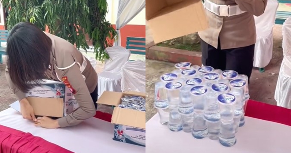 Cara polwan keluarkan air mineral gelas dari kardus ini bikin kagum